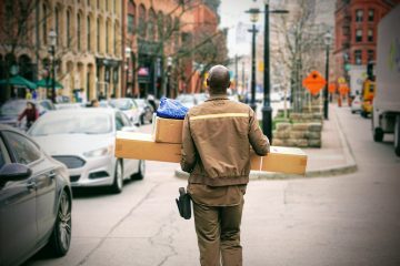 courier carrying parcels